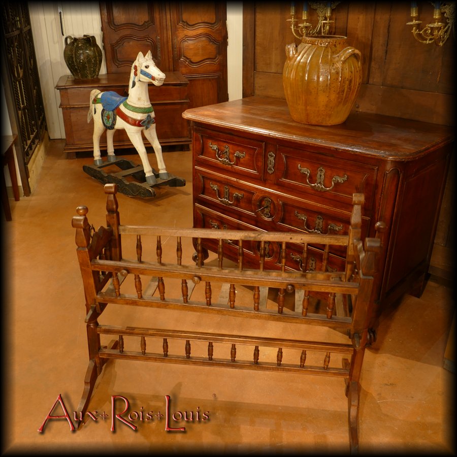 Old wooden furniture lasts many lifetimes. This Cradle was used by
